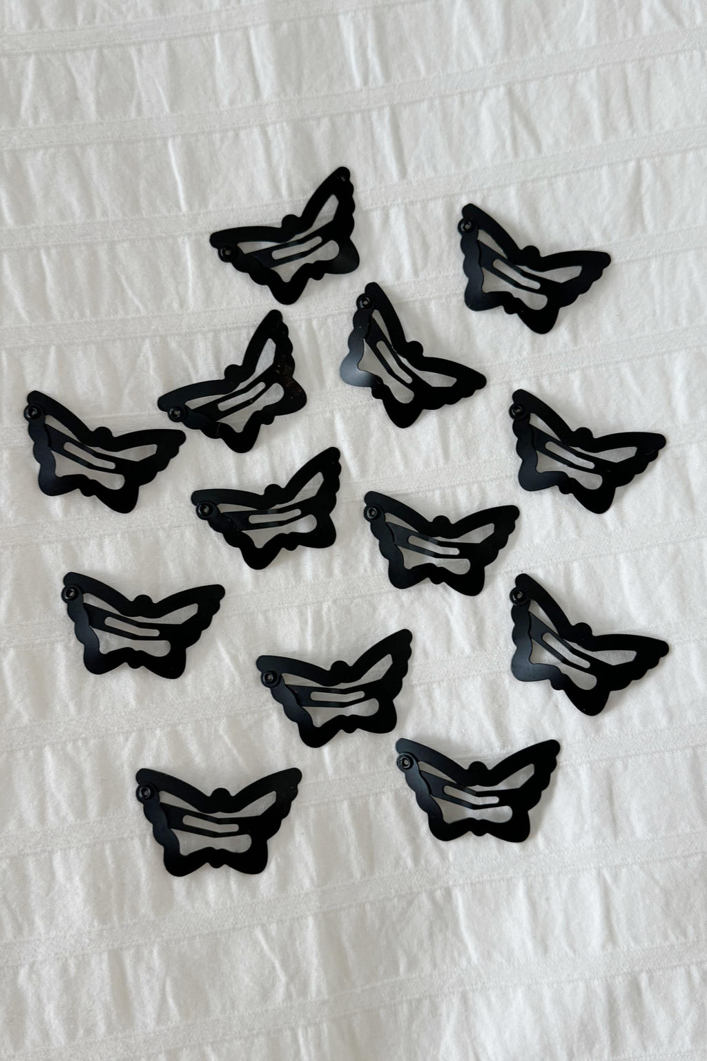 Black Metal Butterfly Toka