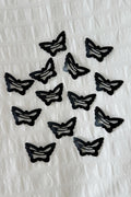 Black Metal Butterfly Toka
