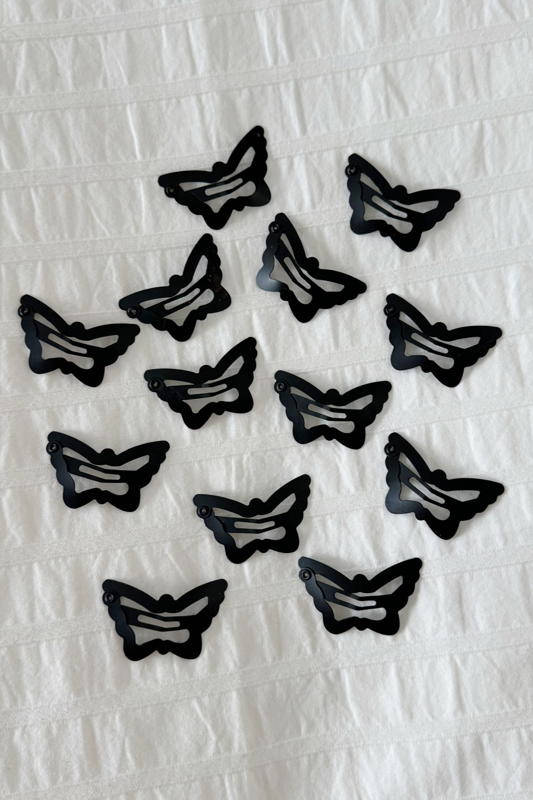 Black Metal Butterfly Toka